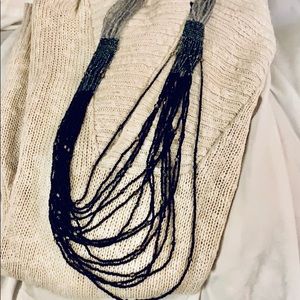 Beautiful dead bead long statement necklace